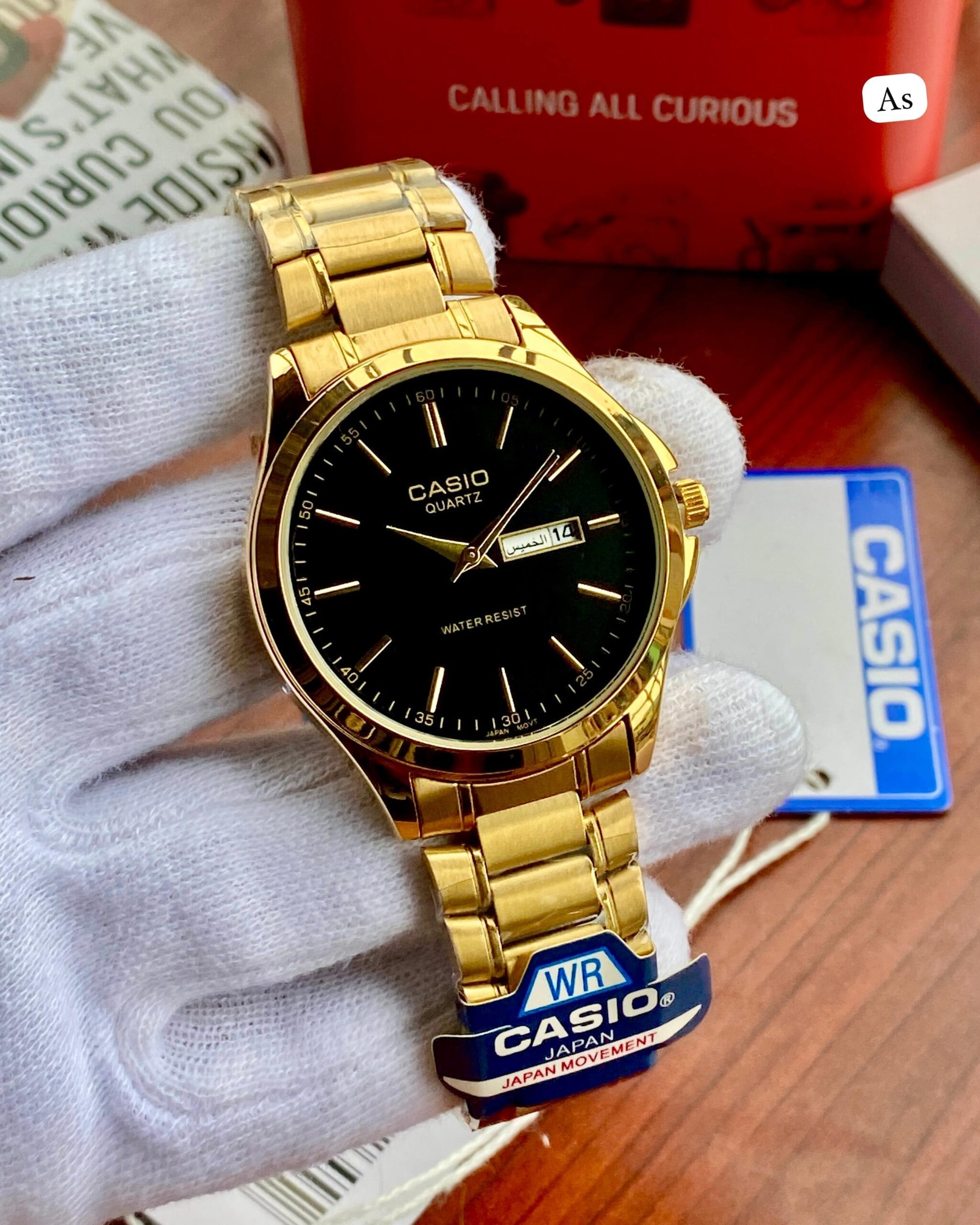 Casio Slim Formal Men’s Watch for Office Wear – Elegant Stainless Steel Quartz Watch 2 Casio Slim Formal Men’s Watch for Office Wear – Elegant Stainless Steel Quartz Watch gold black dial hand view