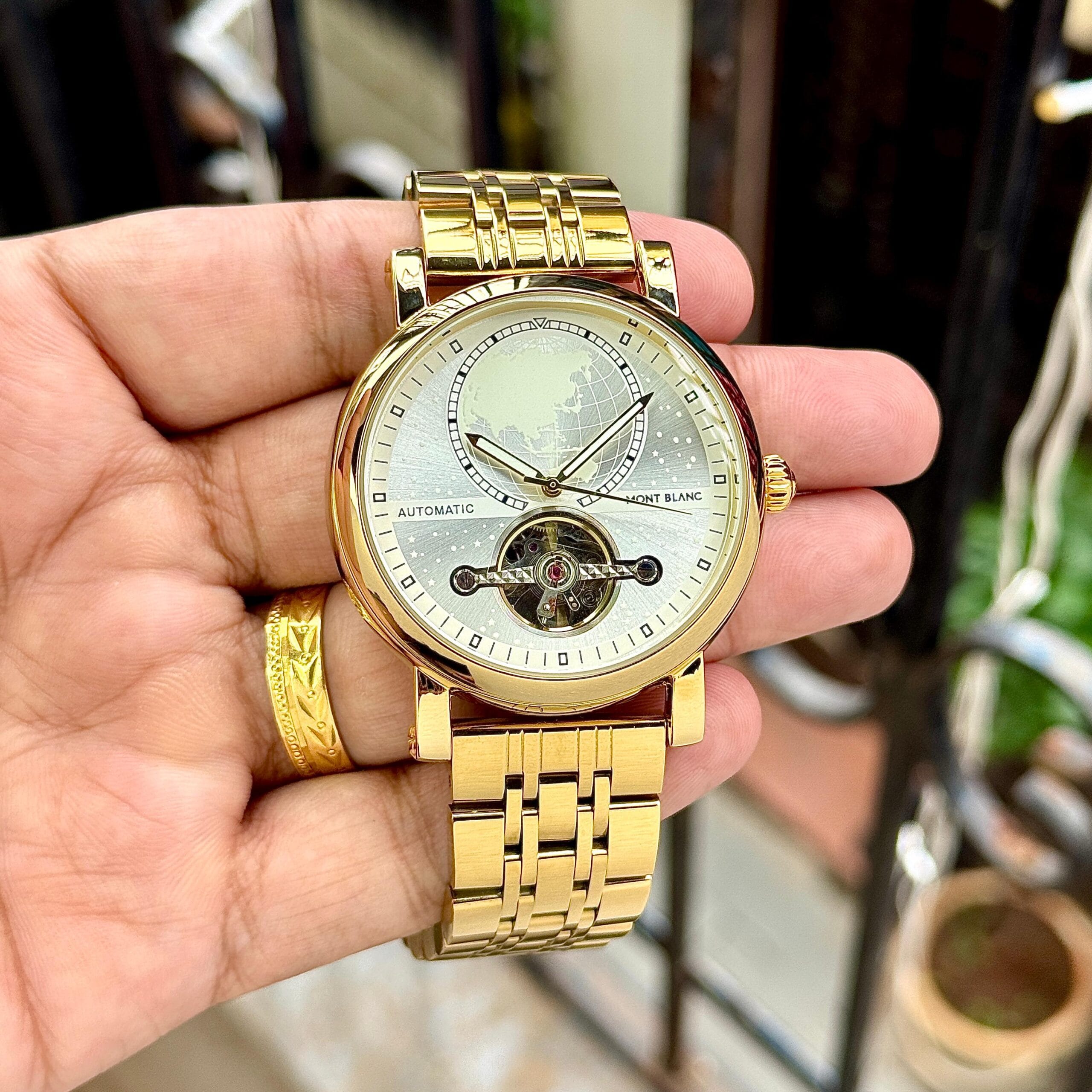 Montblanc Heritage World Map Automatic Men’s Open-Heart Mechanical Watch 2 Montblanc Heritage World Map Automatic Men’s Open-Heart Mechanical Watch hand view