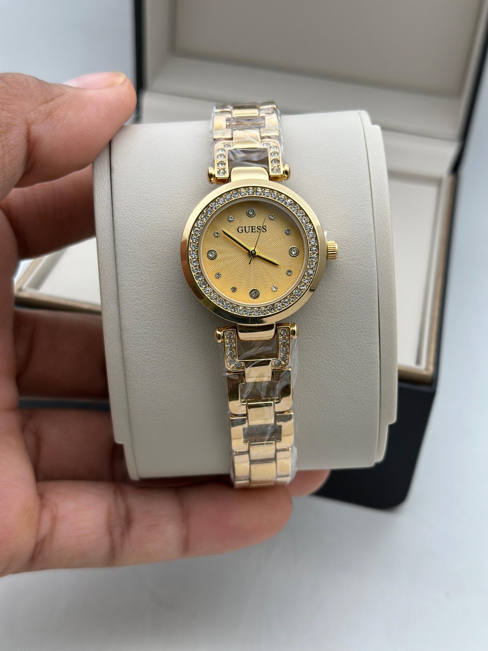 Guess Women’s Crystal Edition Watch | Black Dial with Gold-Tone Chain | Elegant & Timeless Design 4 Guess Womens Crystal edition golden yellow dial front view