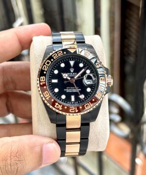Rolex GMT Master II black rose gold watch cushion display