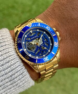 Rolex OceanLux Skeleton Dial Gold Automatic Watch Blue Bezel Wrist
