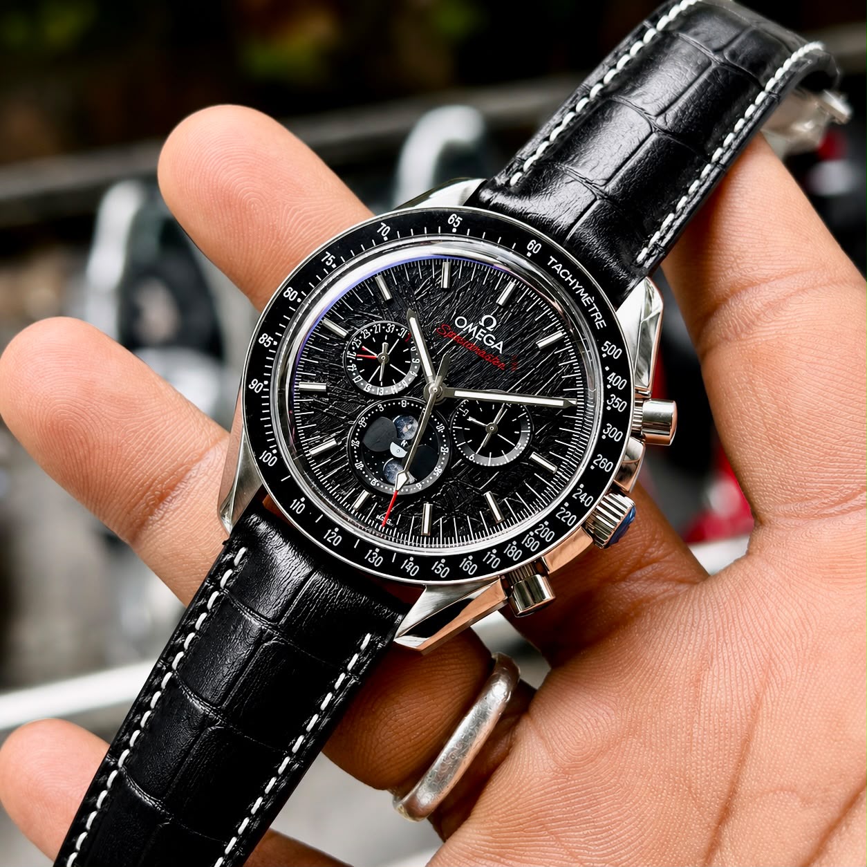 Omega Speedmaster Moonphase Automatic Men's Watch Black Meteorite Dial 2 Omega Speedmaster Moonphase Automatic straight front view