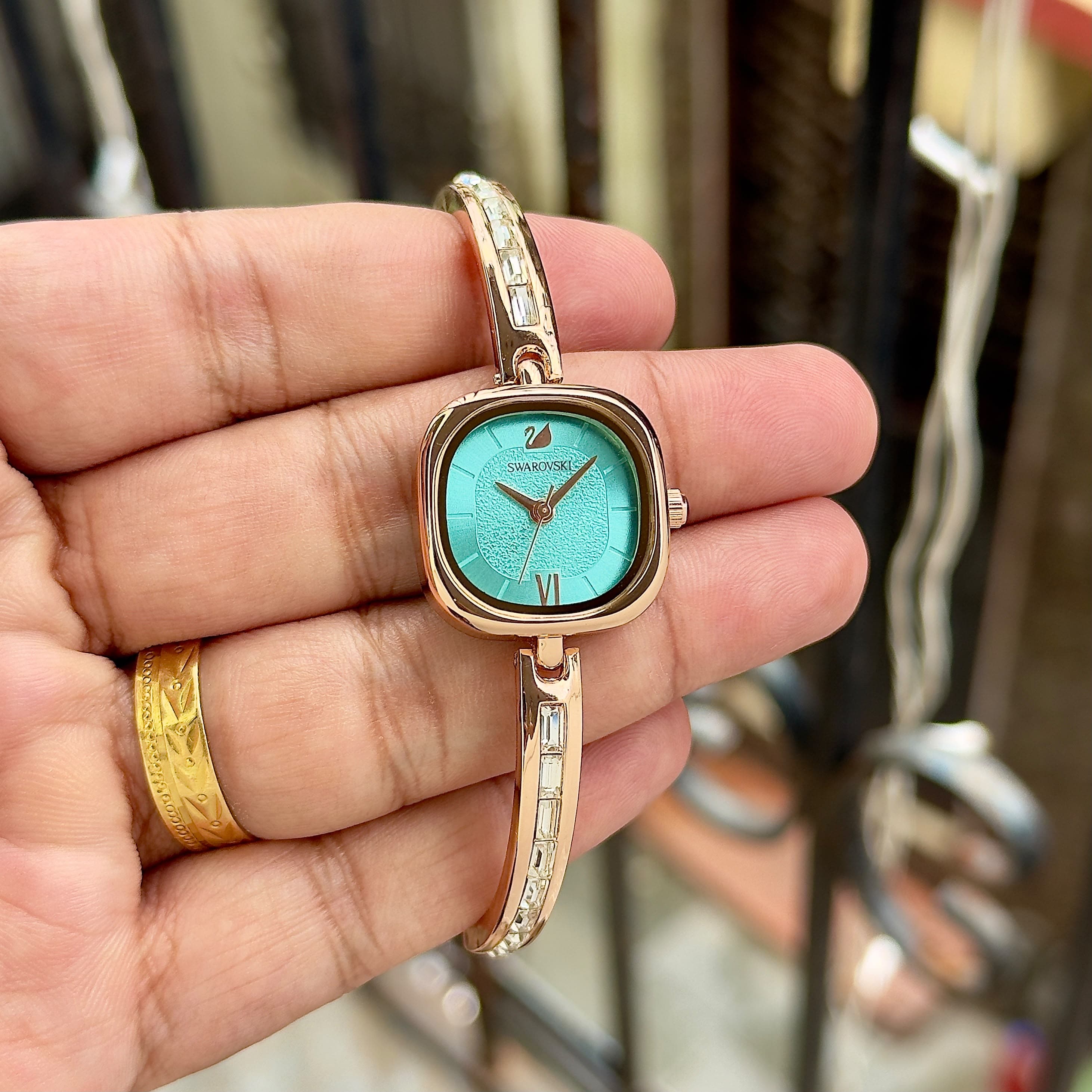Swarovski Elegant Ladies Crystal Bracelet Quartz Watch 9 Swarovski Ladies Watch Turquoise Dial Gold Bracelet